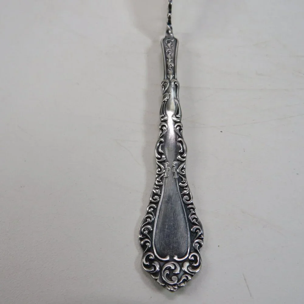 Webster Twisted Handle Butter Knife silver plated  S.L. & G.H. Rogers Company A1